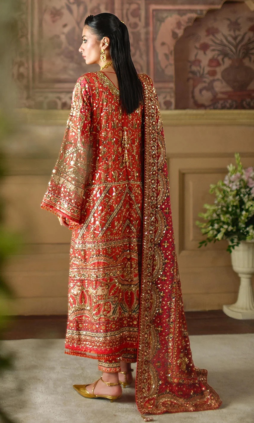 CRIMSON TALE I NOMI ANSARI clothing in gold, red tones.